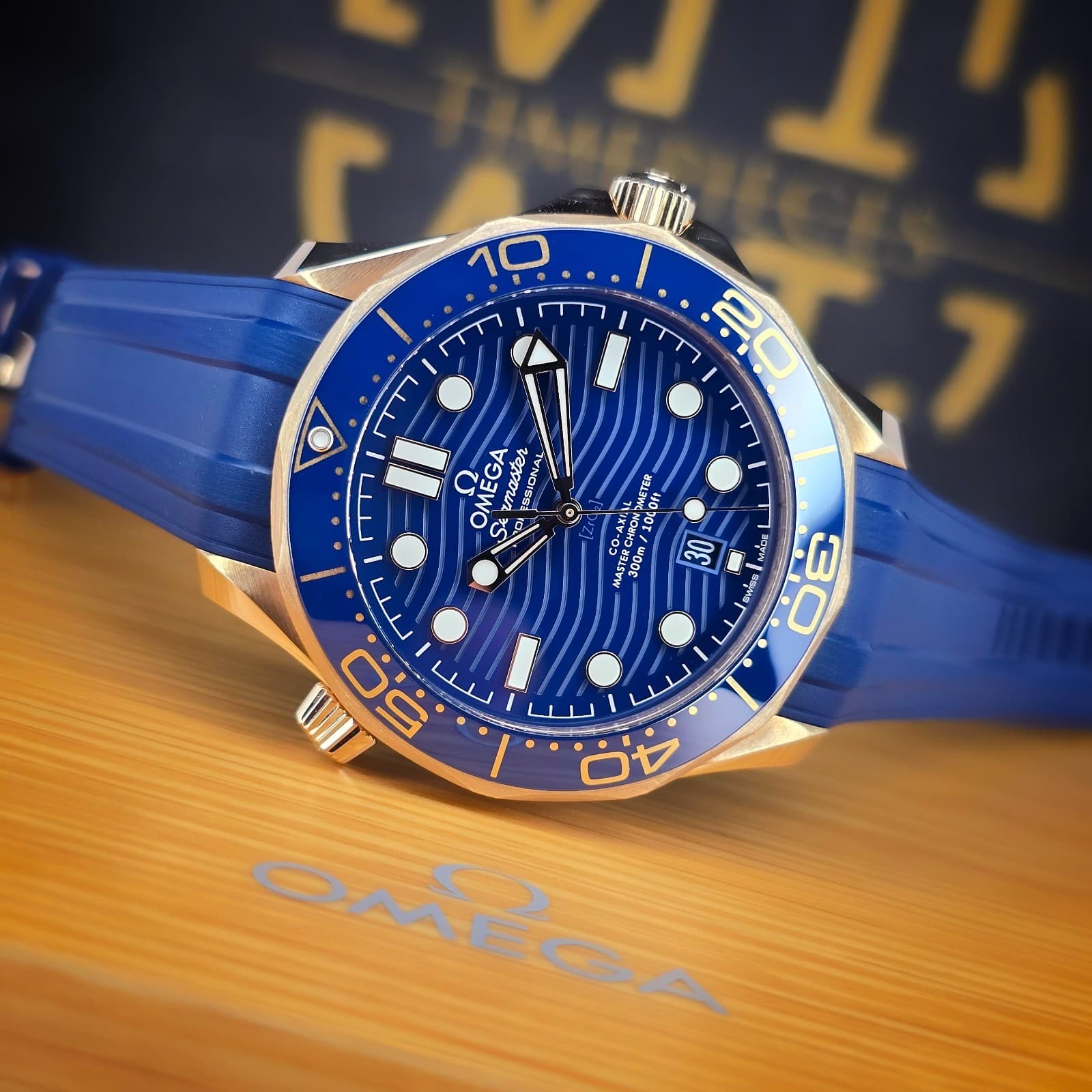OMEGA SEAMASTER DIVER 300M 42MM 210.62.42.20.03.001 18K ROSE GOLD BLUE DIAL B&P