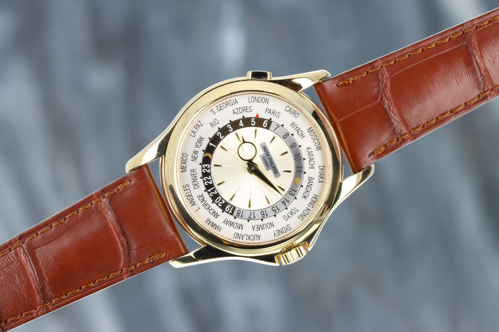 Patek Philippe World Time 5130J-001 Double P, Silver Guilloche Dial Yellow Gold